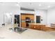 Kitchen featuring granite countertops, stainless steel appliances, and wood cabinets at 4212 Helens Pouroff Ave, North Las Vegas, NV 89085