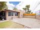 Spacious backyard featuring a large brick patio, perfect for outdoor entertaining and summer barbecues at 4232 Park Ct, Las Vegas, NV 89110