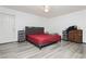Simple bedroom design featuring modern furniture and flooring at 4232 Park Ct, Las Vegas, NV 89110