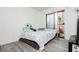 Bedroom with sliding glass door and security bars for extra protection and natural lighting at 4232 Park Ct, Las Vegas, NV 89110