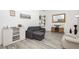 Bright living room with modern decor, hardwood floors, and ample space for entertaining at 4232 Park Ct, Las Vegas, NV 89110