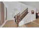A welcoming foyer with a staircase and tile flooring leading into the home at 4641 Therapeutic St, North Las Vegas, NV 89031