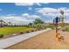 Scenic park view featuring exercise equipment, a walking path and well-maintained grounds for an active lifestyle at 4641 Therapeutic St, North Las Vegas, NV 89031