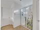 Bright bathroom featuring tiled shower, glass door and modern fixtures at 4641 Therapeutic St, North Las Vegas, NV 89031