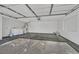 Spacious garage with laundry area and a door to the backyard at 4708 Cohiba Way, North Las Vegas, NV 89031