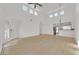 Bright living room featuring wood floors, high ceilings, recessed lighting, and an open floor plan at 4708 Cohiba Way, North Las Vegas, NV 89031