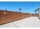 A fully walled backyard with a concrete patio, perfect for outdoor entertainment and privacy at 5282 Monterey Park Cir, Las Vegas, NV 89146