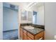 Bathroom featuring a granite countertop, vanity, and modern lighting at 5282 Monterey Park Cir, Las Vegas, NV 89146