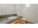 A clean bathroom with a granite countertop and a modern sink at 5282 Monterey Park Cir, Las Vegas, NV 89146