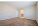 Bedroom with neutral carpet and ensuite access at 5282 Monterey Park Cir, Las Vegas, NV 89146