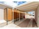 Covered patio with wood privacy fence at 531 New Mexico St, Boulder City, NV 89005
