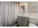 Clean bathroom featuring a shower, vanity, and toilet at 531 New Mexico St, Boulder City, NV 89005