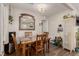 Cozy dining room featuring a wooden table set and decorative mirror at 531 New Mexico St, Boulder City, NV 89005