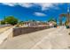 Single story home featuring a landscaped front yard and mature trees at 531 New Mexico St, Boulder City, NV 89005
