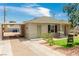 Inviting single-story home featuring a well-kept yard, covered parking, and a welcoming entrance at 531 New Mexico St, Boulder City, NV 89005