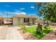 Charming single-story home featuring a well-kept yard, inviting porch, and ample parking at 531 New Mexico St, Boulder City, NV 89005