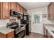 Well-equipped kitchen with stainless steel appliances and ample counter space at 531 New Mexico St, Boulder City, NV 89005