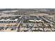 Expansive aerial view of a well-planned community with modern apartments and single-Gathering homes near a highway and shopping at 5927 Villa Loma St, Las Vegas, NV 89148