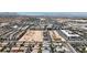 High aerial shot showcasing a vibrant community with ongoing construction and an excellent planned development, near the highway at 5927 Villa Loma St, Las Vegas, NV 89148