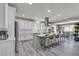 Bright, spacious kitchen featuring a large island, modern appliances, and ample counter space at 5927 Villa Loma St, Las Vegas, NV 89148