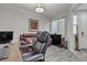 Inviting office space with a comfortable leather sofa and functional workspace at 5927 Villa Loma St, Las Vegas, NV 89148