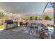 This covered patio offers an outdoor kitchen, comfortable seating, and is perfect for entertaining at 5927 Villa Loma St, Las Vegas, NV 89148