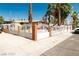 View of single story home with decorative fence and drought resistant landscaping on a sunny day at 624 N Bruce St, Las Vegas, NV 89101