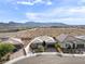Stunning aerial view of a well-maintained neighborhood with beautiful single-Gathering homes and lush landscaping at 6421 Winecup St, Las Vegas, NV 89149