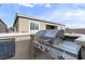 Close up of an outdoor kitchen featuring a stainless steel built-in grill and granite countertop, perfect for entertaining at 6421 Winecup St, Las Vegas, NV 89149
