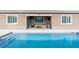 Step into your own outdoor oasis with a sparkling pool, comfortable dining, and covered patio at 6421 Winecup St, Las Vegas, NV 89149