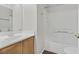 Bathroom features a shower, toilet, and wooden sink vanity at 6559 Tumbleweed Ridge Ln # 103, Henderson, NV 89011