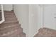 Carpeted staircase leading to the upper level, showcasing a clean and modern design at 6559 Tumbleweed Ridge Ln # 103, Henderson, NV 89011