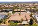 Aerial view showcasing an expansive home in a neighborhood with desert landscaping at 7250 Birkland Ct, Las Vegas, NV 89117