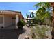 Charming backyard with a gazebo and well-maintained landscaping on a sunny day is perfect for outdoor enjoyment at 7250 Birkland Ct, Las Vegas, NV 89117
