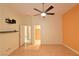 Bright bedroom featuring a ceiling fan, hardwood floors, and a walk-in closet at 7250 Birkland Ct, Las Vegas, NV 89117