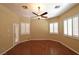Large bedroom boasts hardwood floors, abundant natural light, and neutral color scheme at 7250 Birkland Ct, Las Vegas, NV 89117