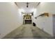 Expansive garage featuring high ceilings, a built-in loft space, and plenty of room for storage at 7250 Birkland Ct, Las Vegas, NV 89117