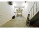 Functional garage space with ample room for parking and storage, featuring an automatic door at 7250 Birkland Ct, Las Vegas, NV 89117