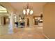 This home features an open floorplan that flows from the kitchen, dining and living areas at 7250 Birkland Ct, Las Vegas, NV 89117