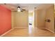 Spacious living room featuring hardwood floors and a modern ceiling fan at 7250 Birkland Ct, Las Vegas, NV 89117