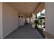 Covered patio showcasing a comfortable outdoor space with columns, fans and well-maintained grounds at 7250 Birkland Ct, Las Vegas, NV 89117