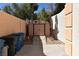 Backyard storage shed with a side area for storage, enclosed by a block wall at 7250 Birkland Ct, Las Vegas, NV 89117
