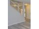 Bright entryway featuring stylish wood-look flooring and white trim, creating a clean and modern aesthetic at 7716 Bauble Ave, Las Vegas, NV 89128