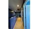 Upstairs hallway with neutral carpet leads to the bedrooms at 7760 Trends Ct, Las Vegas, NV 89149