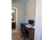Home office area with a built-in desk, chair, and computer setup at 7760 Trends Ct, Las Vegas, NV 89149