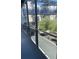 Balcony view of a community's green space and multi-level apartments at 8925 W Flamingo Rd # 105, Las Vegas, NV 89147