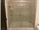 Bathroom with a sliding glass door shower enclosure at 8925 W Flamingo Rd # 105, Las Vegas, NV 89147