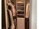 Walk-in closet offering plenty of storage with clothing racks and shelving at 8925 W Flamingo Rd # 105, Las Vegas, NV 89147