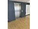 View of a residential elevator with bright wood flooring at 8925 W Flamingo Rd # 105, Las Vegas, NV 89147