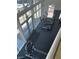 A bright fitness center features treadmills and large windows overlooking the pool at 8925 W Flamingo Rd # 105, Las Vegas, NV 89147